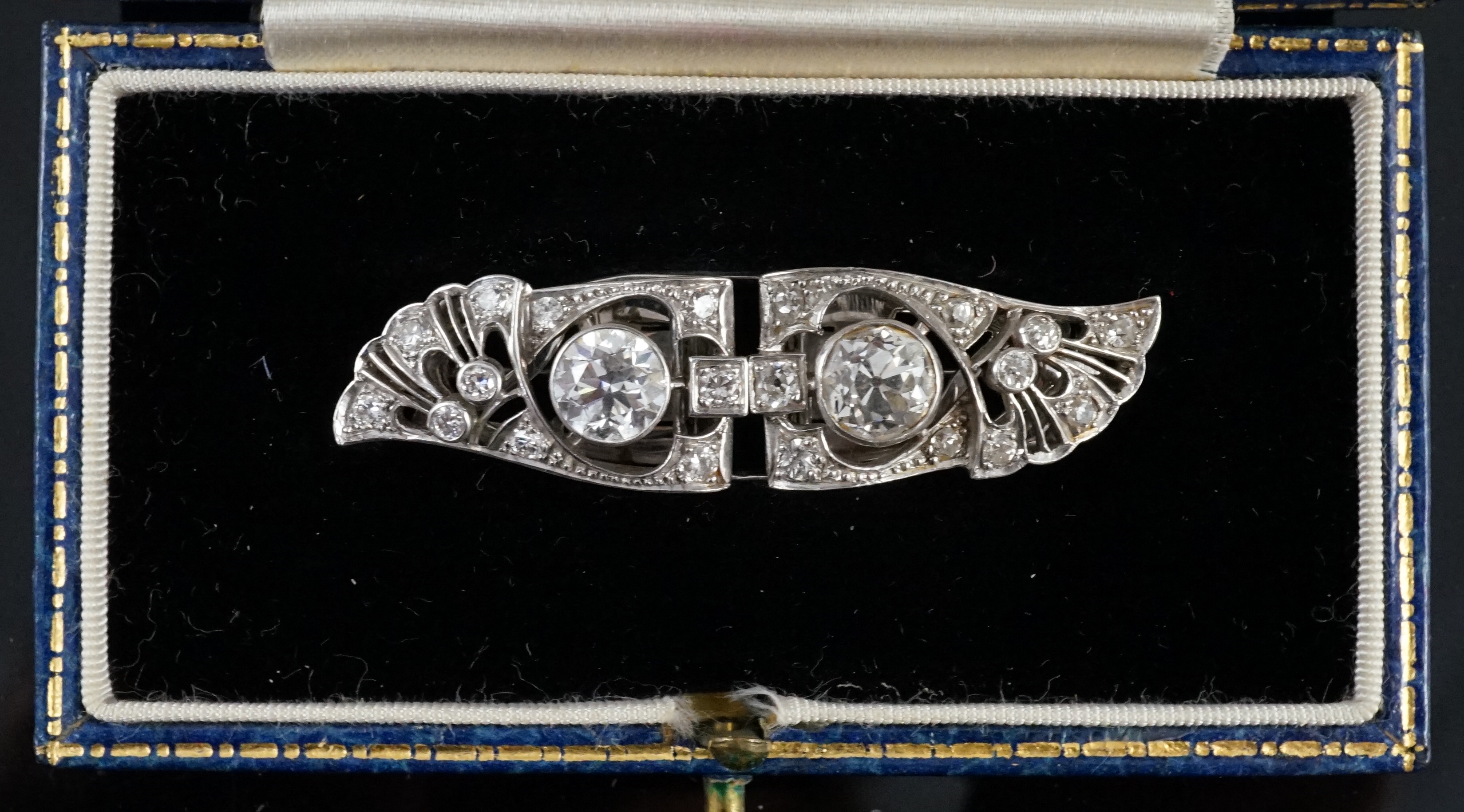 A good Art Deco platinum and diamond cluster set double clip brooch